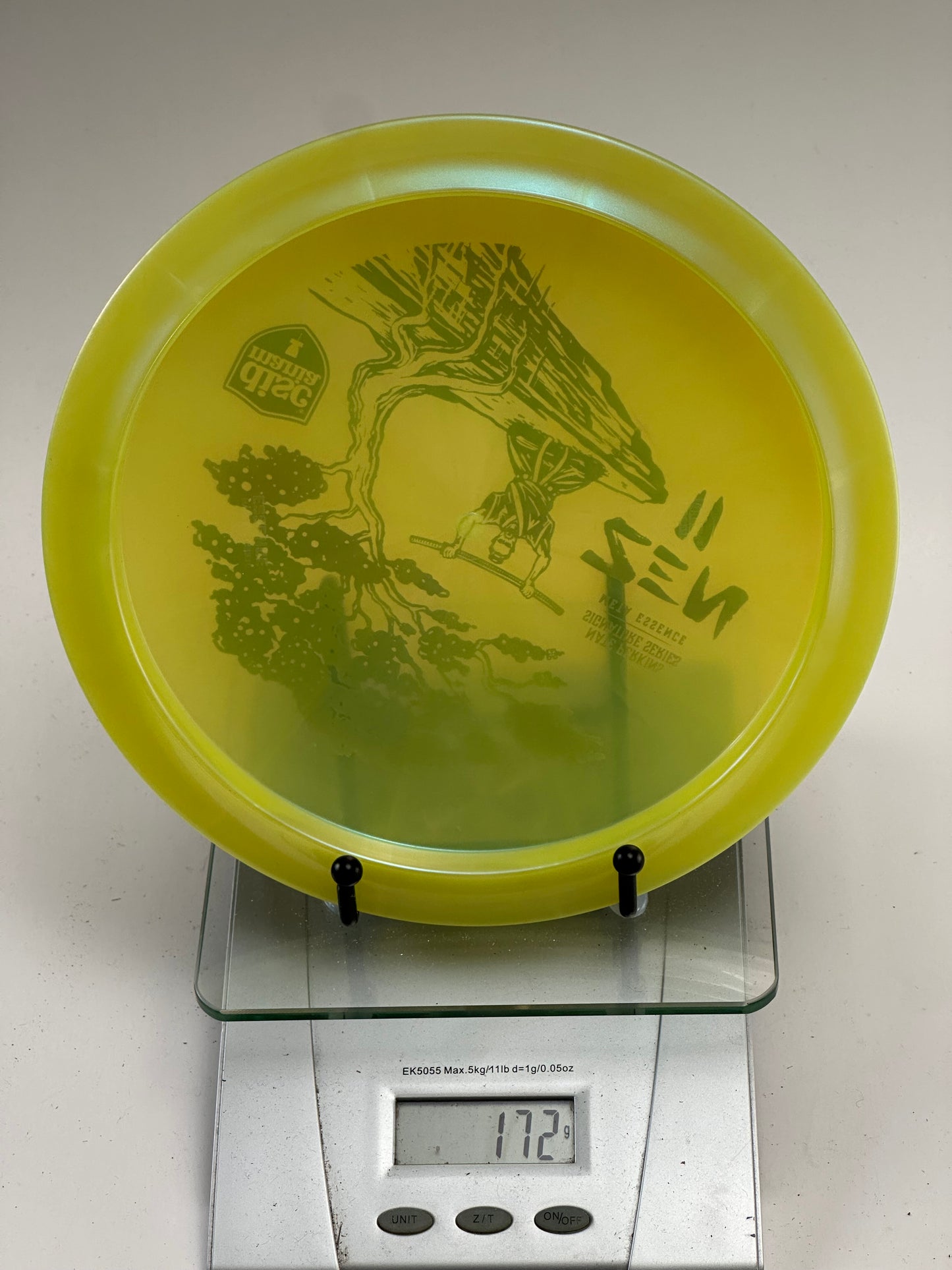 Discmania Meta Essence Nate Perkins Zen II – Yellow Rainbow Foil Tree
