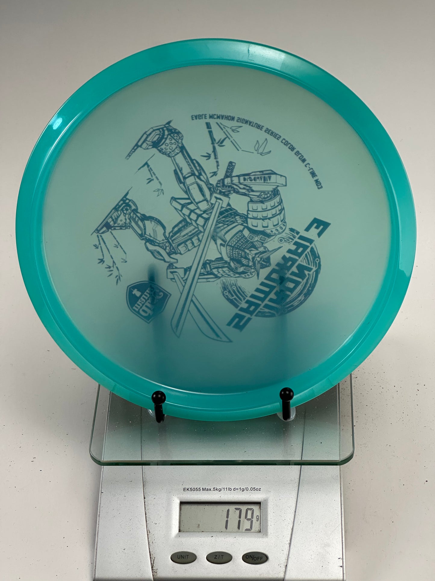 Discmania C-Line MD3 Iron Samurai 3 Midrange – Translucent Aqua
