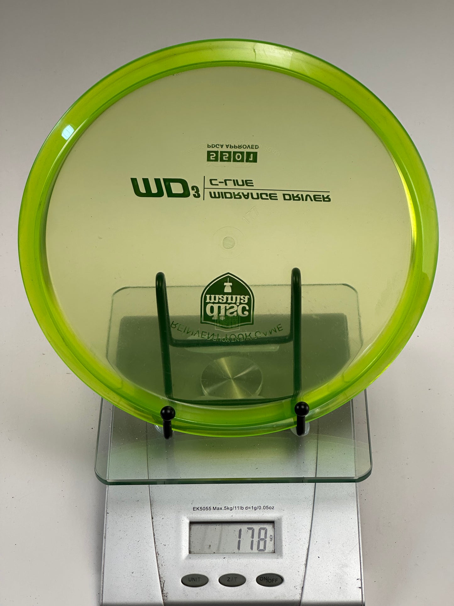 Discmania C-Line MD3 Midrange – Translucent Yellow-Green Shield Stamp