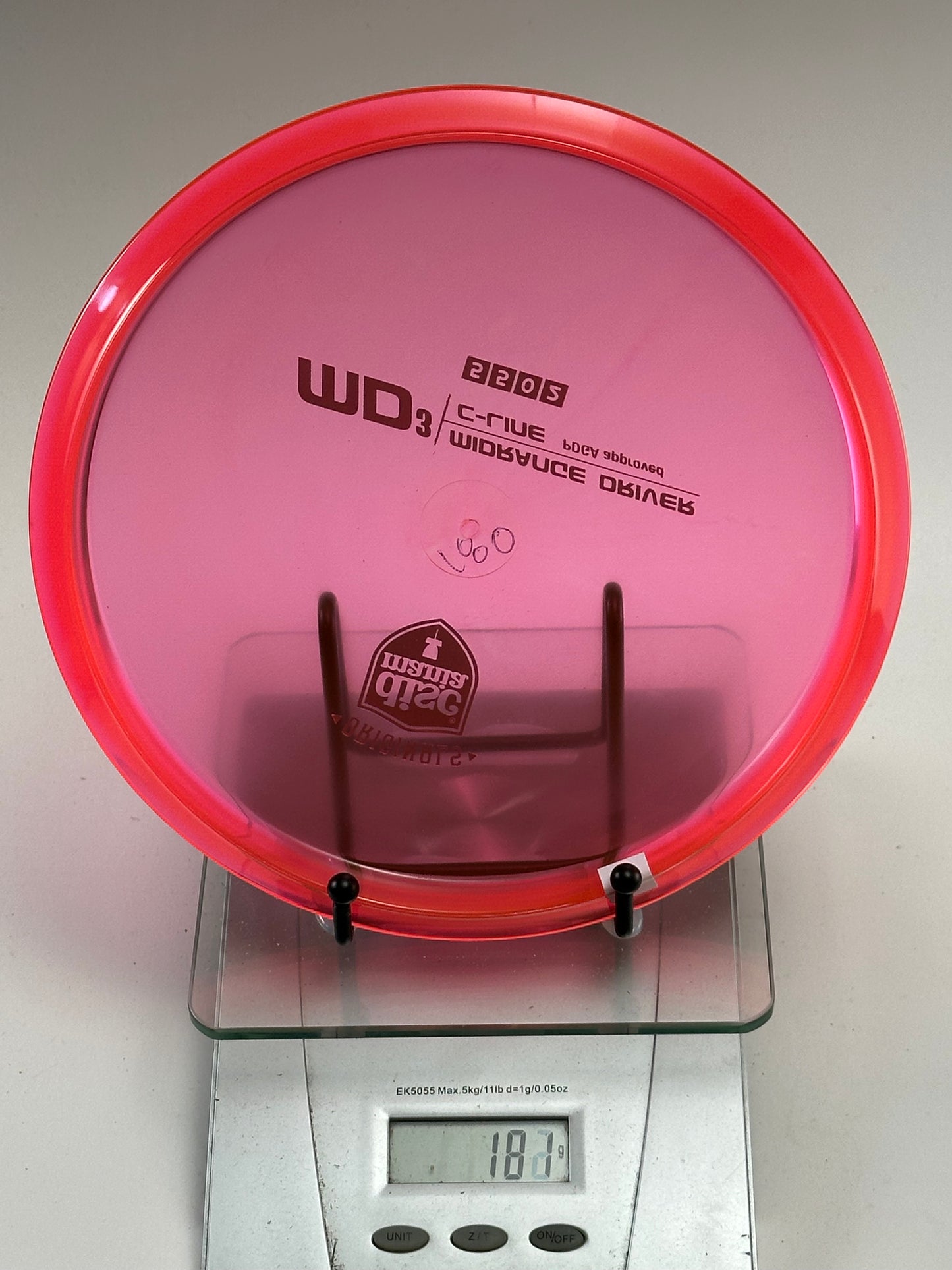 Discmania MD3 C-Line Midrange – Originals Shield Stamp (181g) Transparent Red