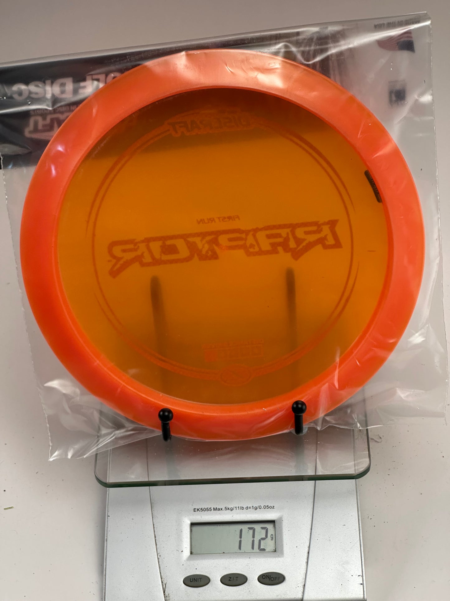 Discraft Raptor First Run Z (172g) Transparent Orange Distance Driver