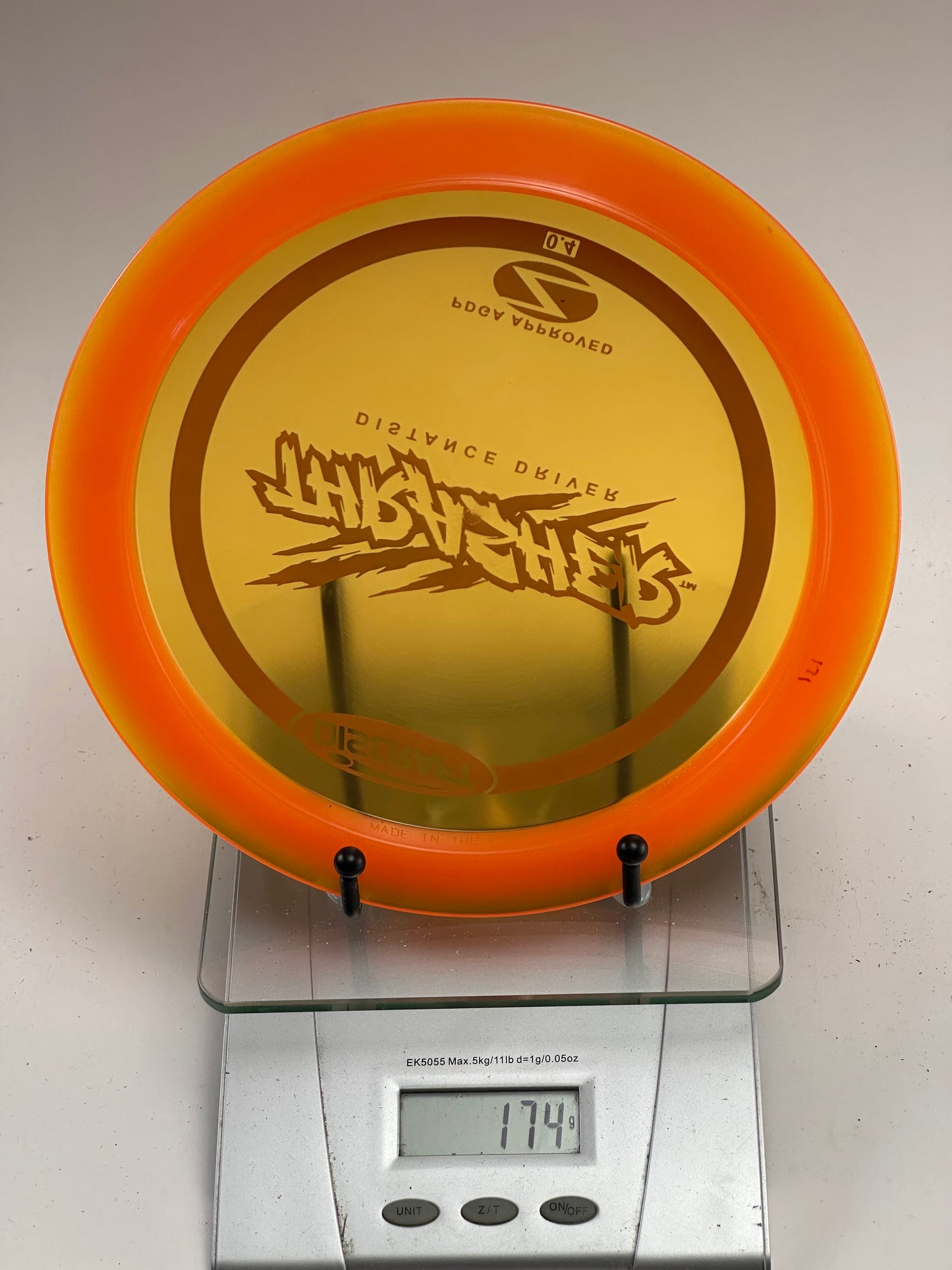 Discraft Z Thrasher Distance Driver (Transparent Yellow/Orange Rim) 173g