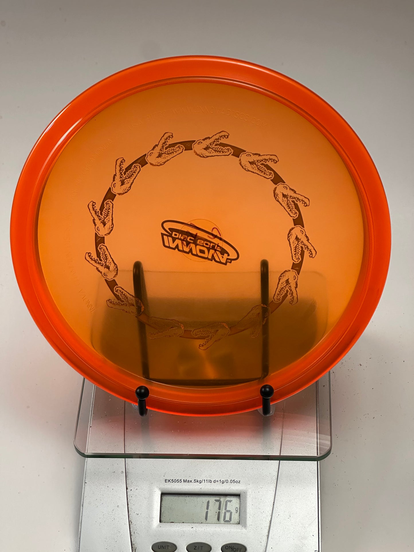 Innova Champion Gator – Transparent Orange Alligator Jaw Stamp (176g)