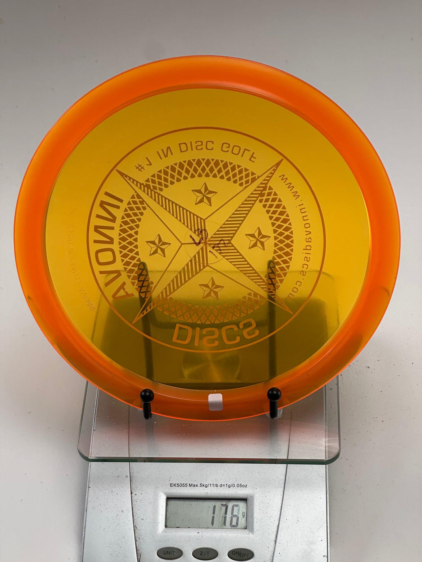 Innova Champion Leopard3 – Transparent Yellow w/ Orange Rim, Silver Star Stamp