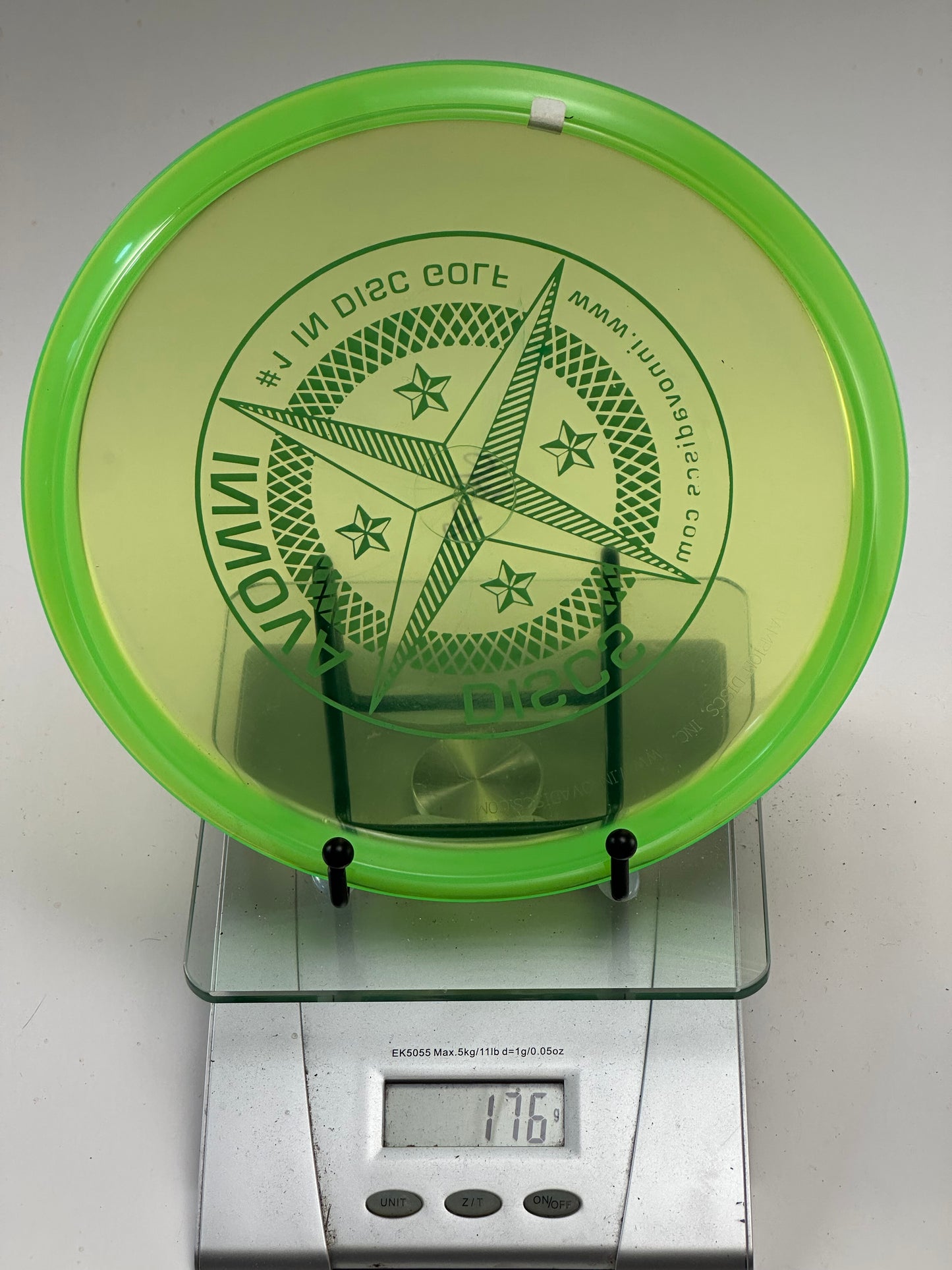 Innova Champion Roc3 176g Transparent Yellow/Green Rim – Compass Stamp