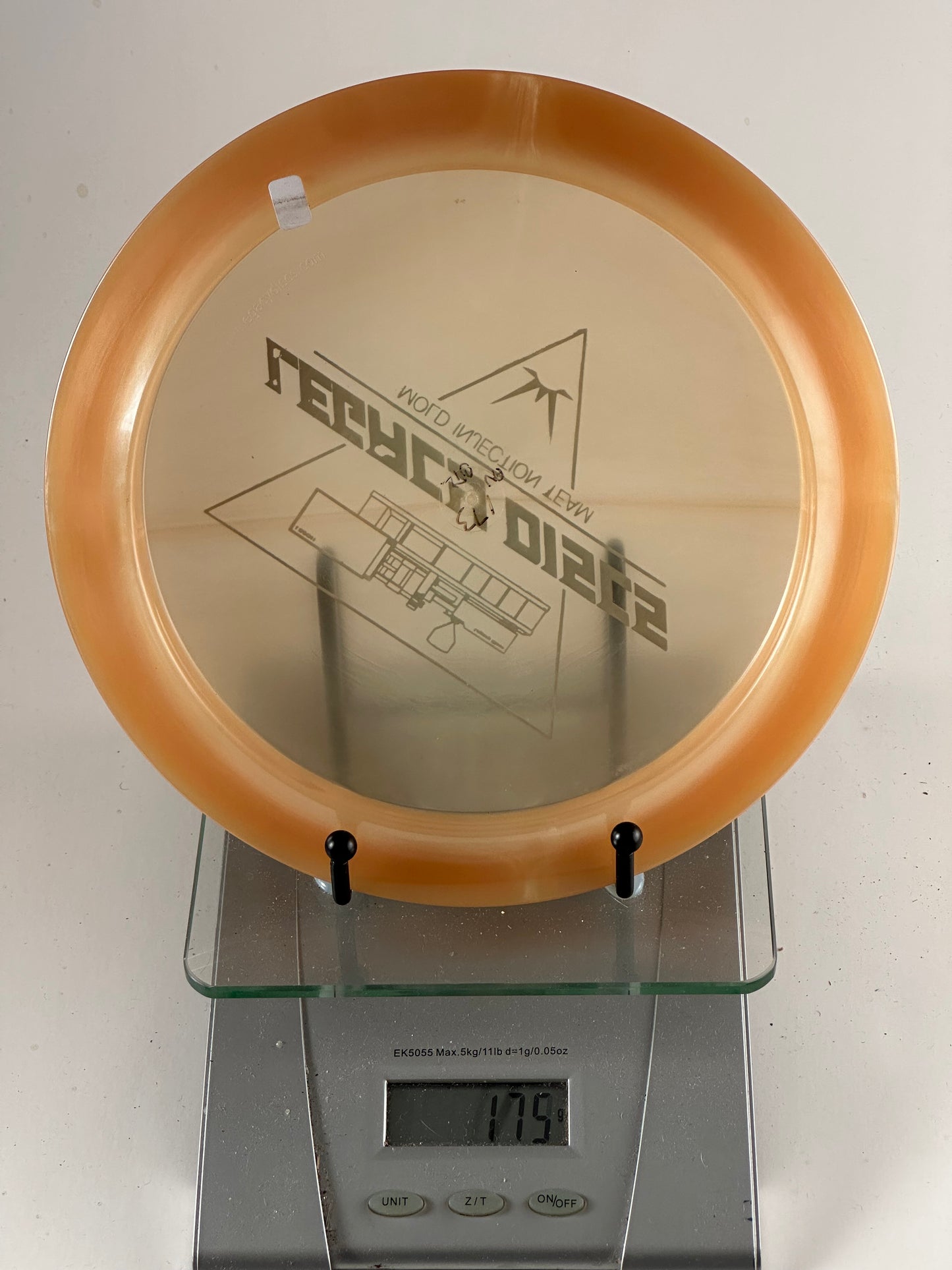 Legacy Mold Injection Team Distance Driver - Translucent Orange 174g