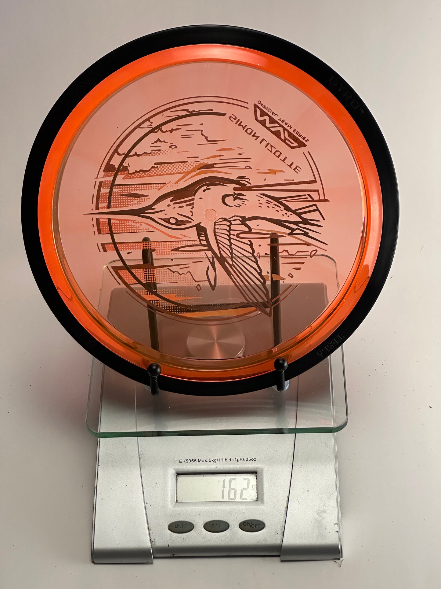 MVP Plasma Tesla (Simon Lizotte Team Series) Transparent Orange/Black Rim 163g