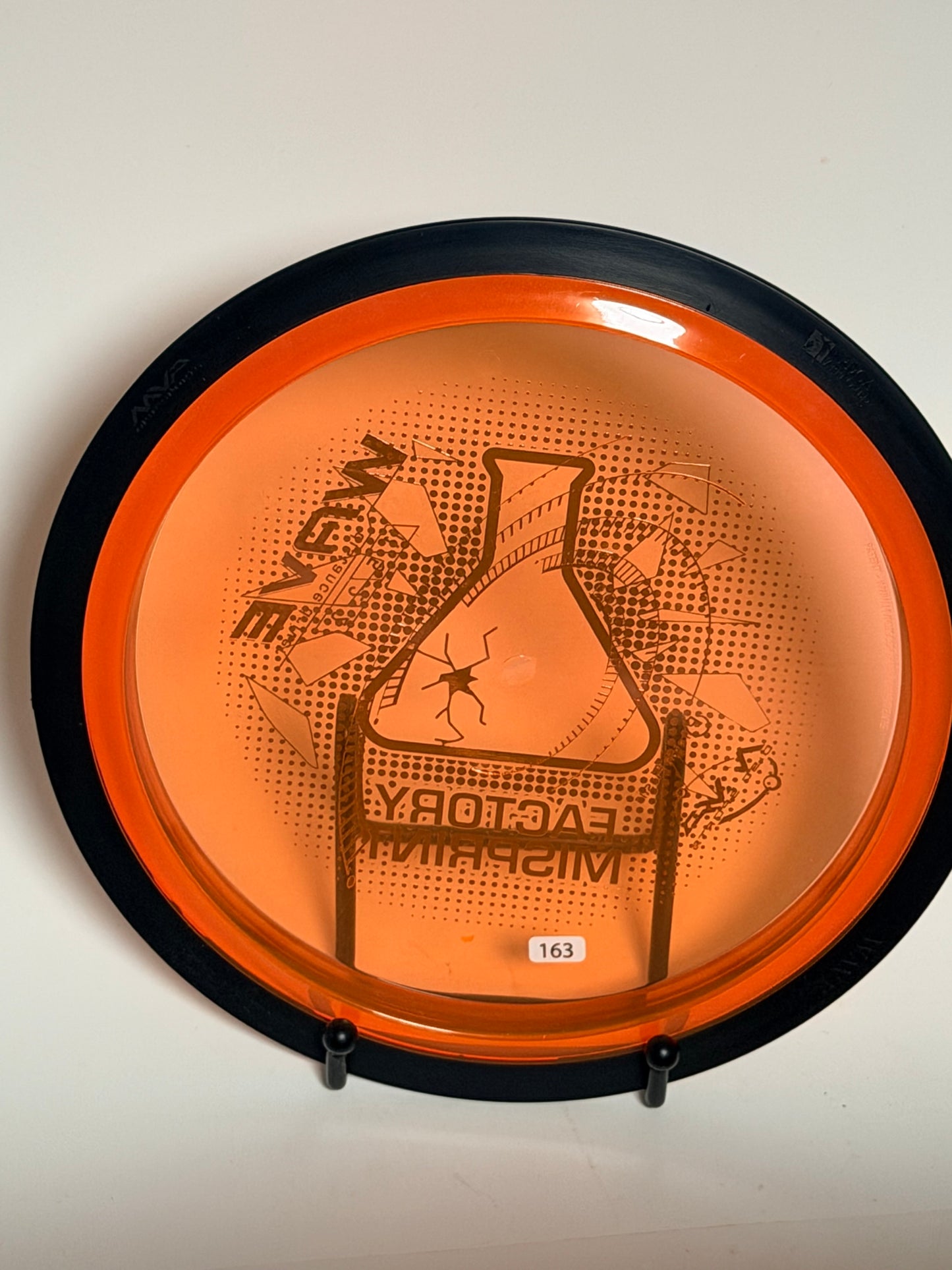 MVP Neutron Wave Factory Misprint – Orange/Black Rim, Holographic Stamp