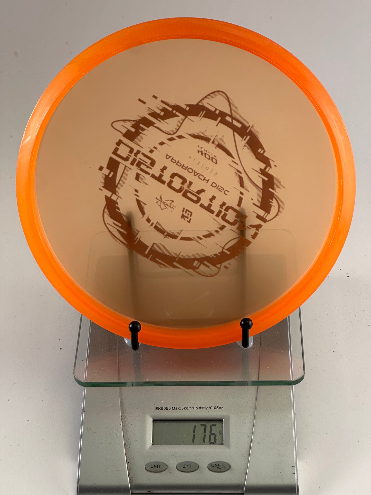 Prodigy Distortion – 400 Plastic Approach Disc (Translucent Orange Rim)