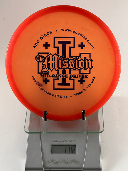 ABC Discs Champion-like translucent premium plastic (clear/translucent) Mission ABC Discs Mission mid-range driver translucent premium plastic orange with red rim black stamp