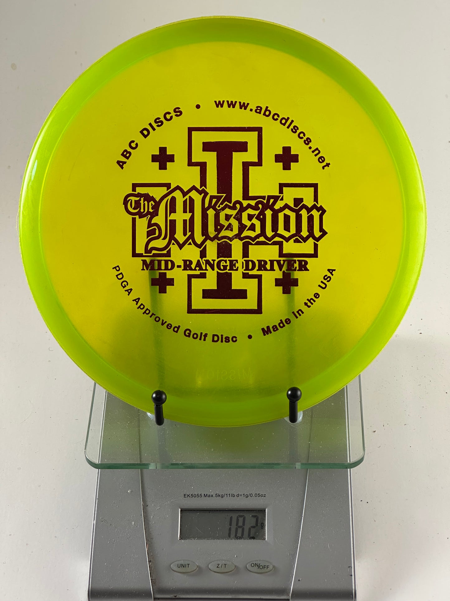 ABC Discs Champion-like translucent premium plastic Mission ABC Discs Mission mid-range driver translucent premium plastic neon yellow/green dark red stamp