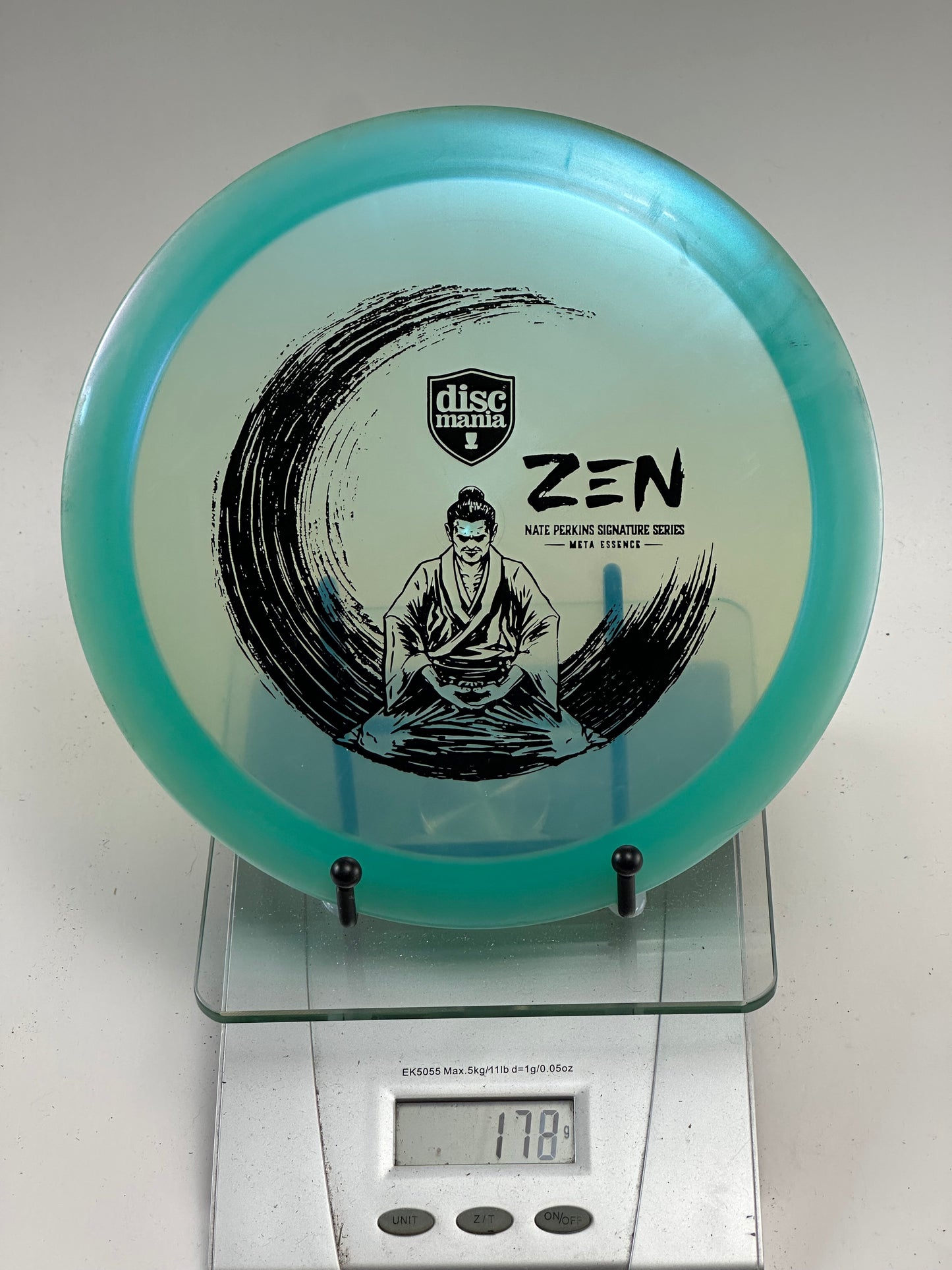 Discmania Meta Essence (Nate Perkins ZEN) – Translucent Blue w/ Aqua Rim