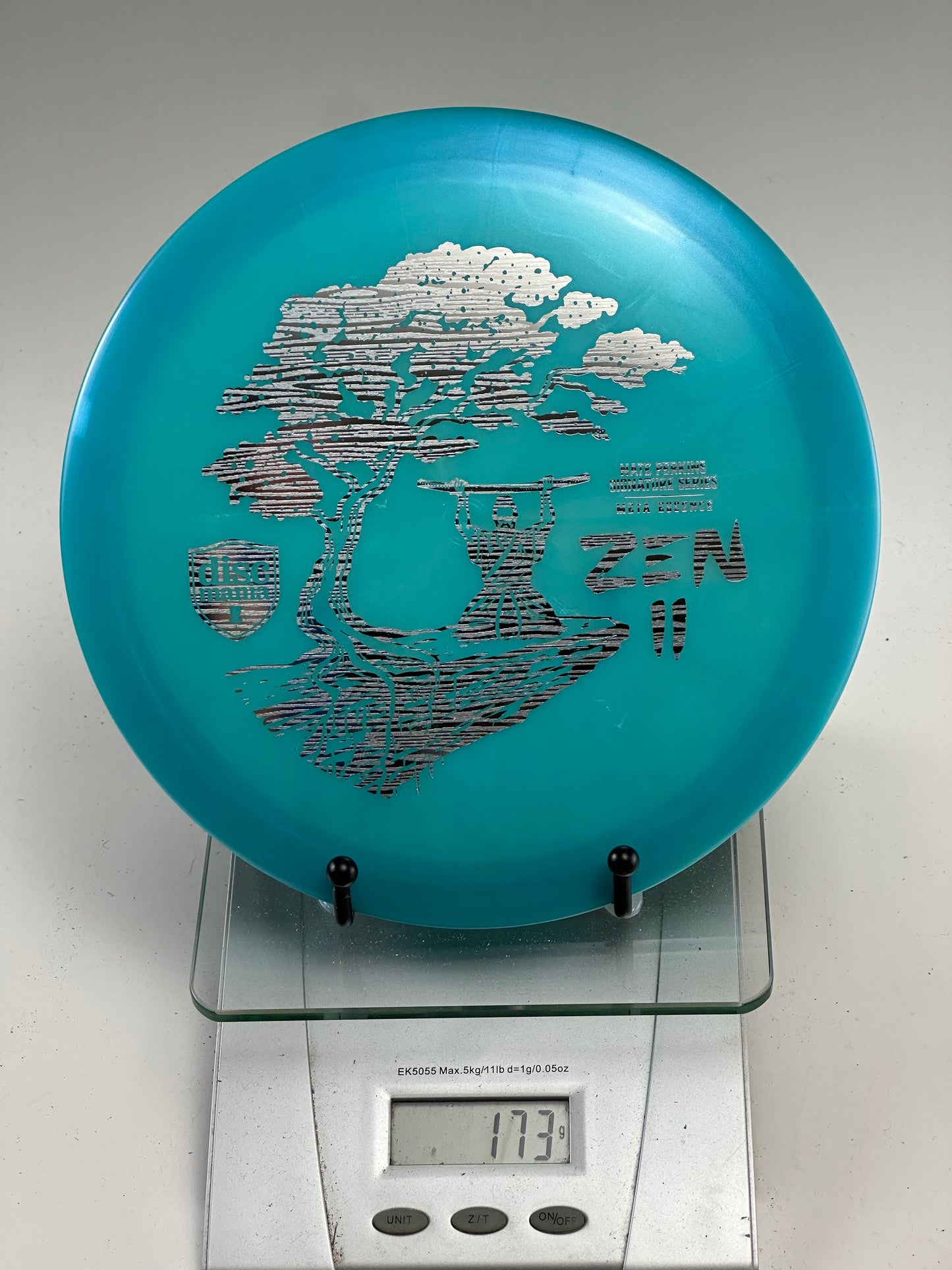 Discmania Meta Essence – Nate Perkins Zen II Silver Tree Stamp (Blue)