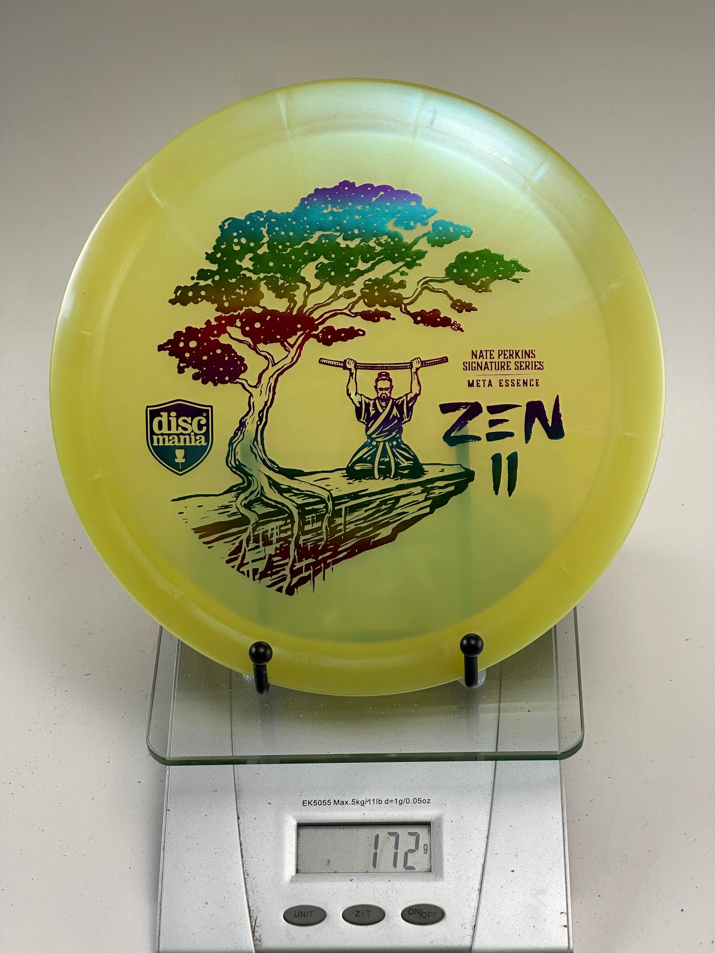 Discmania Meta Essence Nate Perkins Zen II – Yellow Rainbow Foil Tree