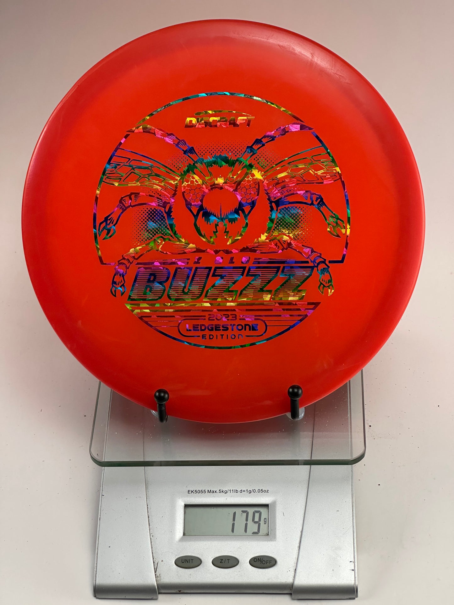 Discraft Buzzz Z (2023 Ledgestone) Transparent Red Midrange w/ Rainbow Stamp