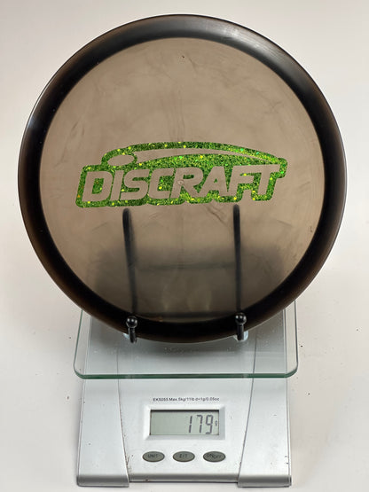 Discraft Buzzz Z Midrange 179g - Transparent Smoke w/ Green Glitter Stamp