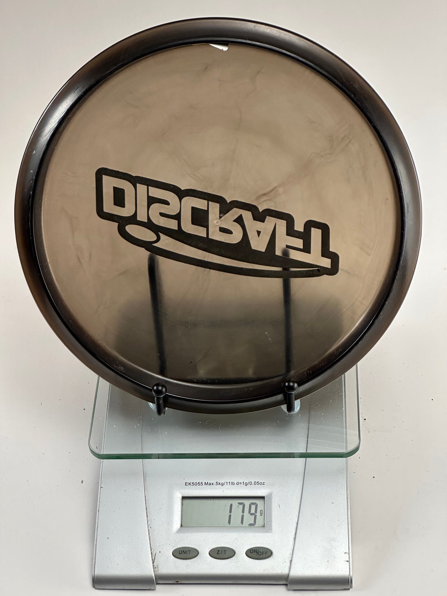 Discraft Buzzz Z Midrange 179g - Transparent Smoke w/ Green Glitter Stamp