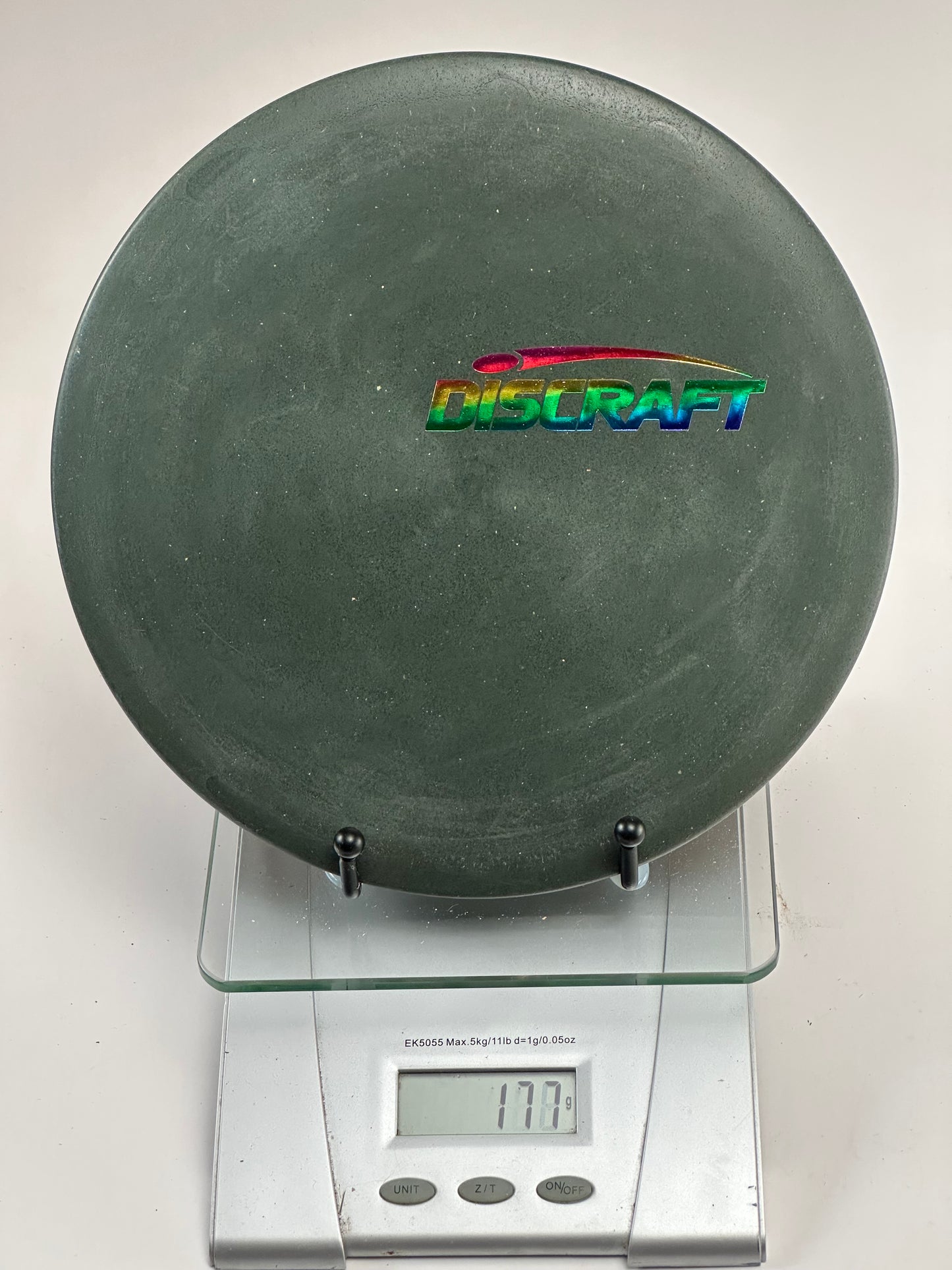 Discraft Buzzz Z Midrange – Dark Green w/ Rainbow Discraft Stamp