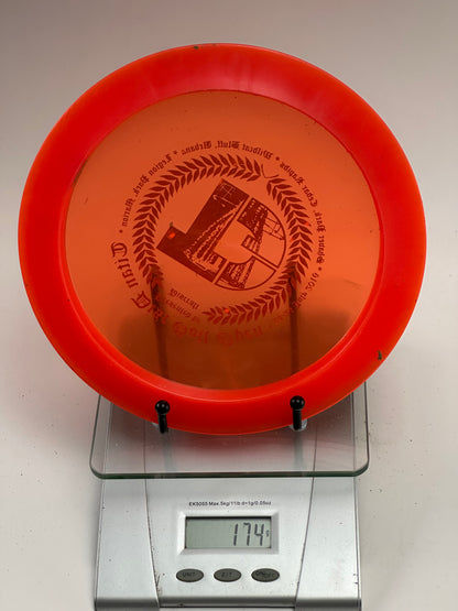 Discraft Z Crank Distance Driver | Titan Disc Golf Open Stamp | Translucent Orange