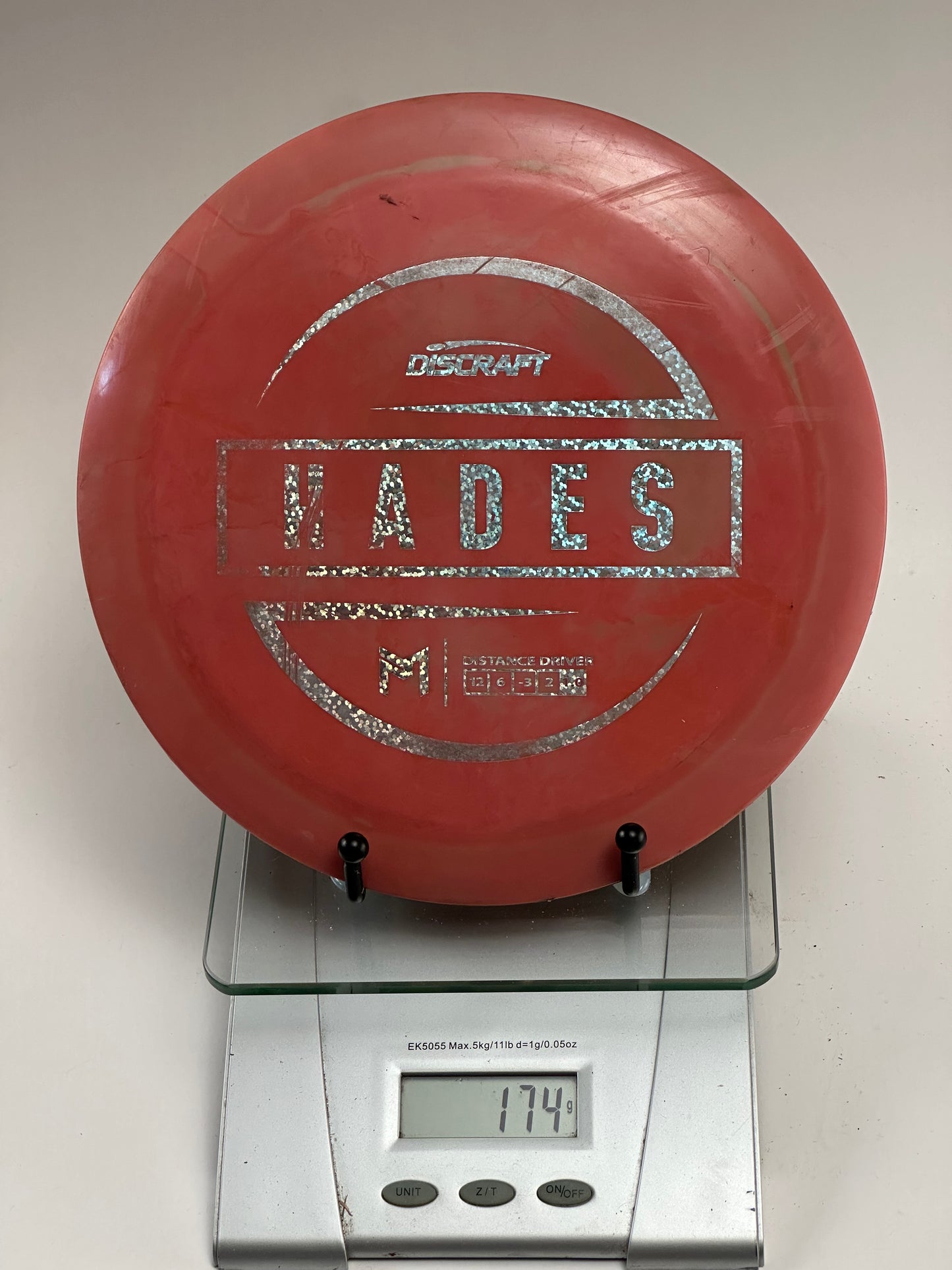 Discraft ESP Hades Distance Driver (Swirly Red, Holographic Silver Stamp)