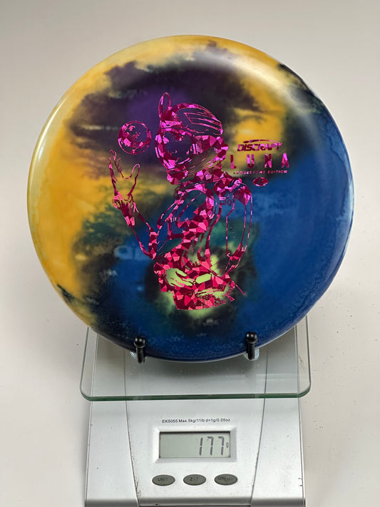 Discraft ESP Swirl Luna (2022 Ledgestone) – Blue/Yellow Swirl, Pink Foil