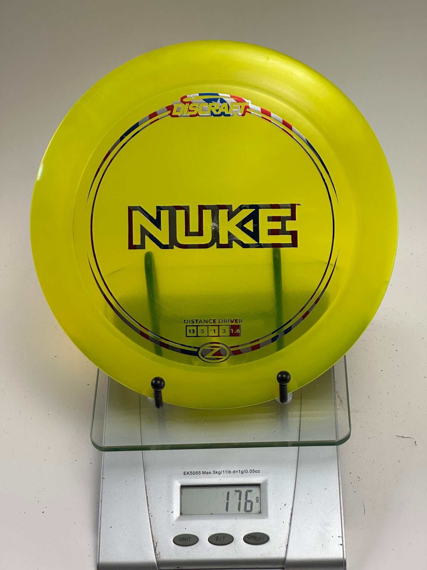 Discraft Z Nuke Distance Driver – Transparent Yellow, Multi-Foil Stamp