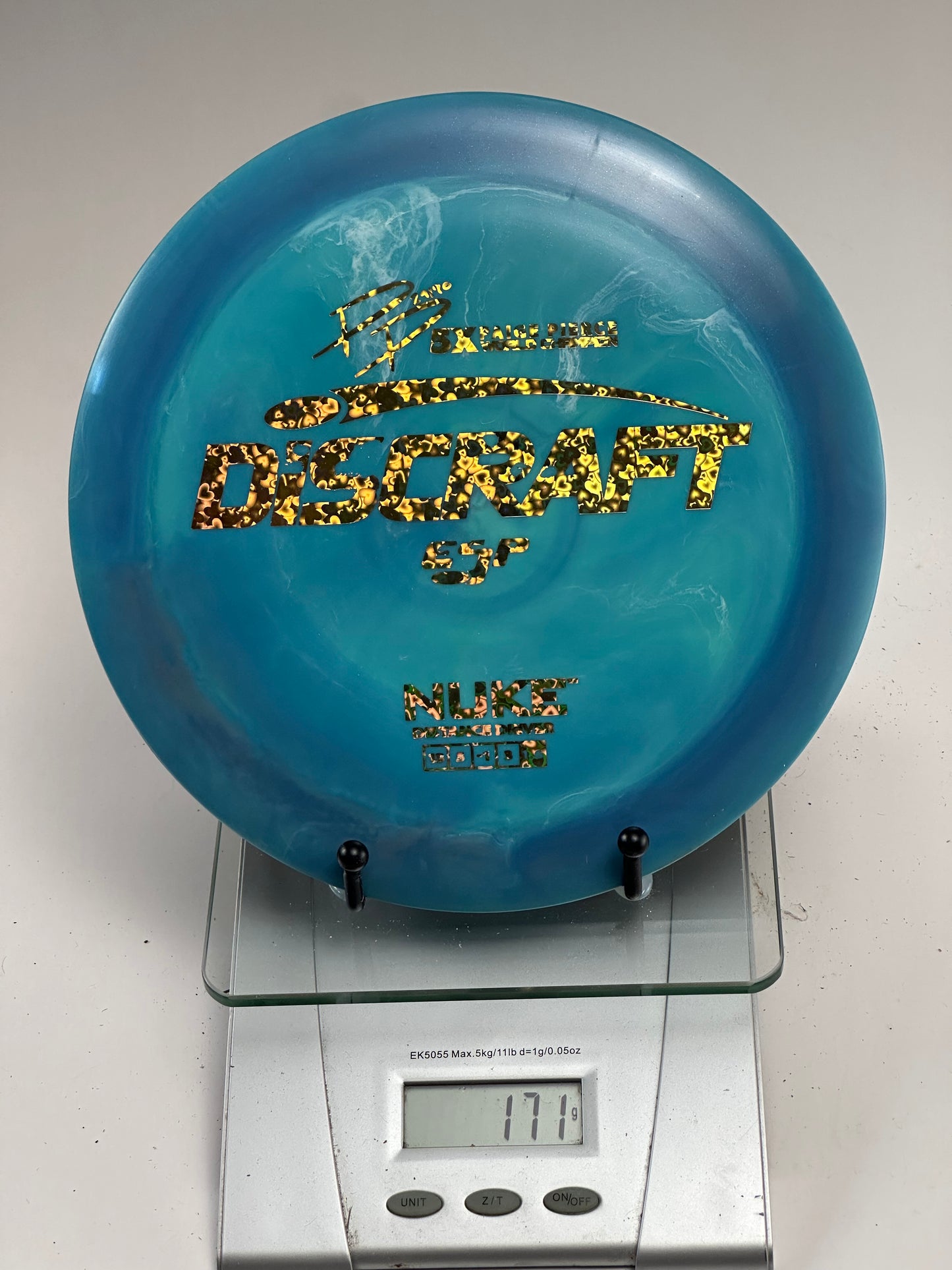 Discraft ESP Nuke Distance Driver – Swirly Blue w/ Gold Holographic Stamp