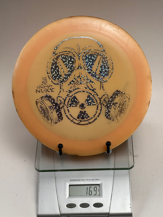 Discraft Z Nuke Distance Driver – Big Z Gas Mask Stamp, Clear Orange