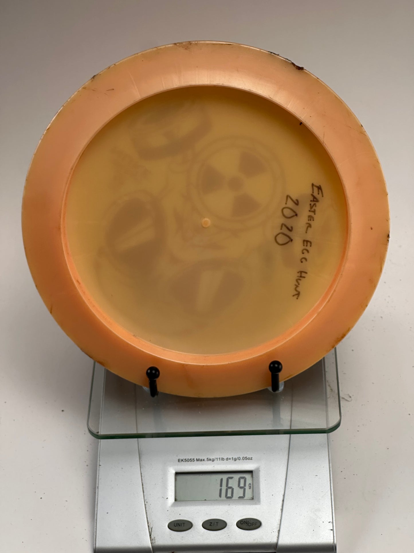 Discraft Z Nuke Distance Driver – Big Z Gas Mask Stamp, Clear Orange