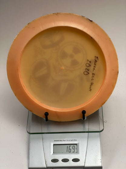 Discraft Z Nuke Distance Driver – Big Z Gas Mask Stamp, Clear Orange