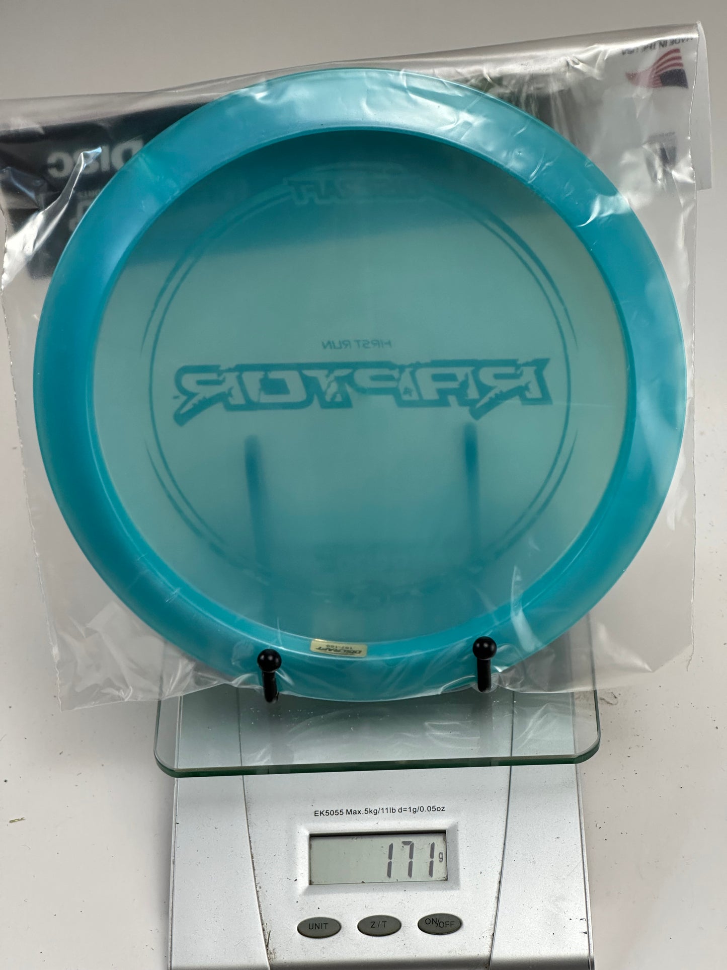 Discraft Raptor First Run Z Distance Driver - Transparent Blue/Pink Stamp