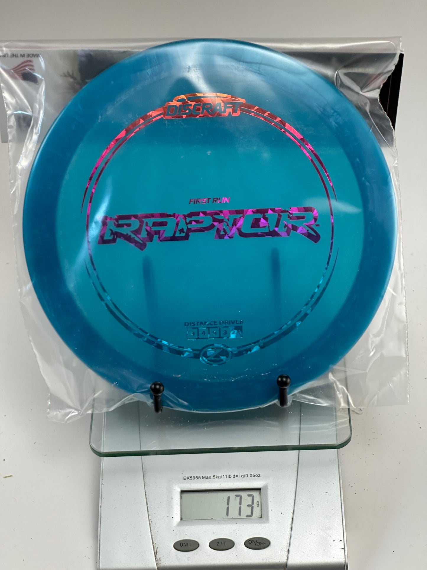 Discraft Raptor (First Run) Z Distance Driver – Transparent Teal