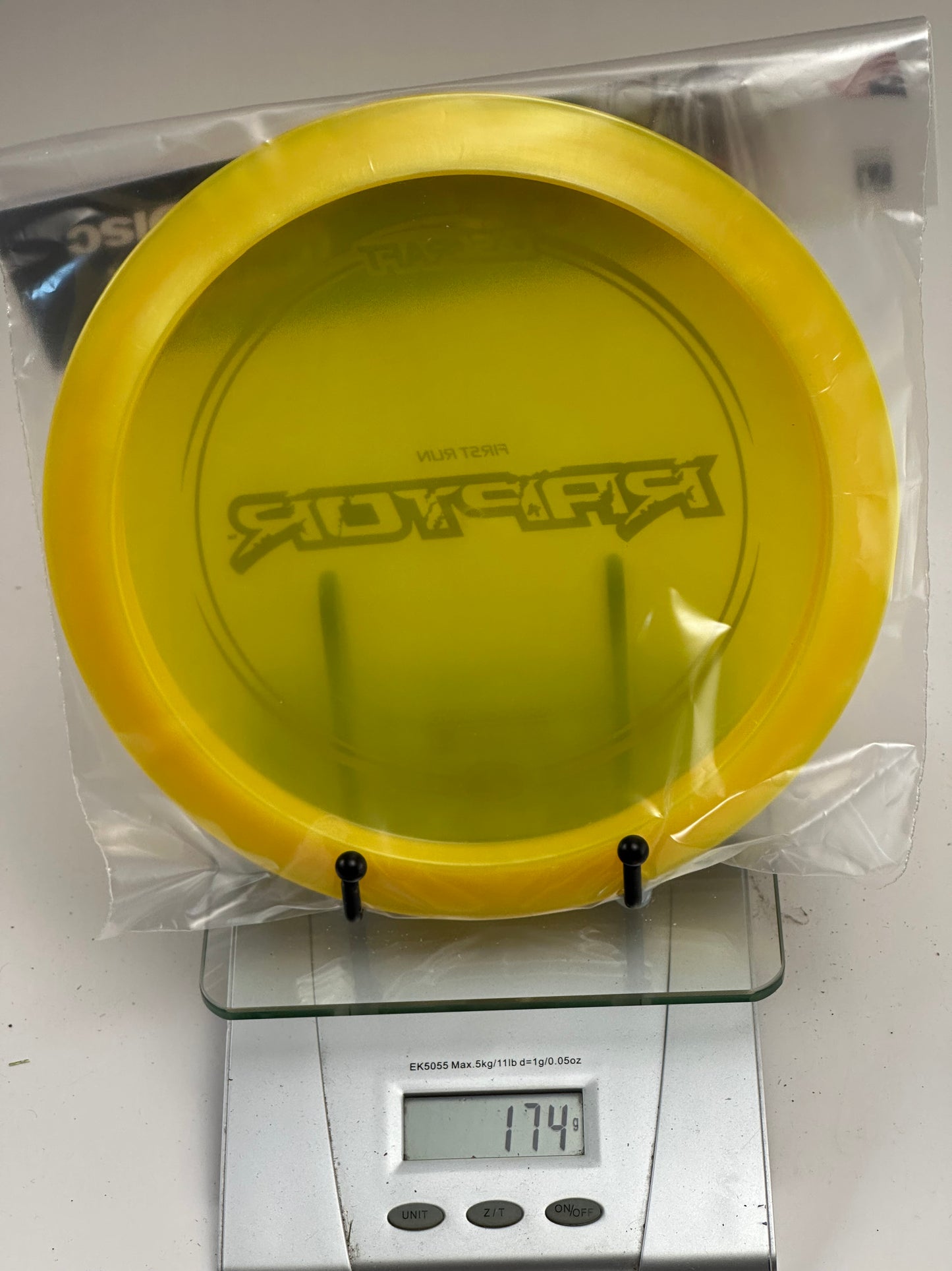 Discraft Raptor First Run Z Distance Driver - Clear Yellow