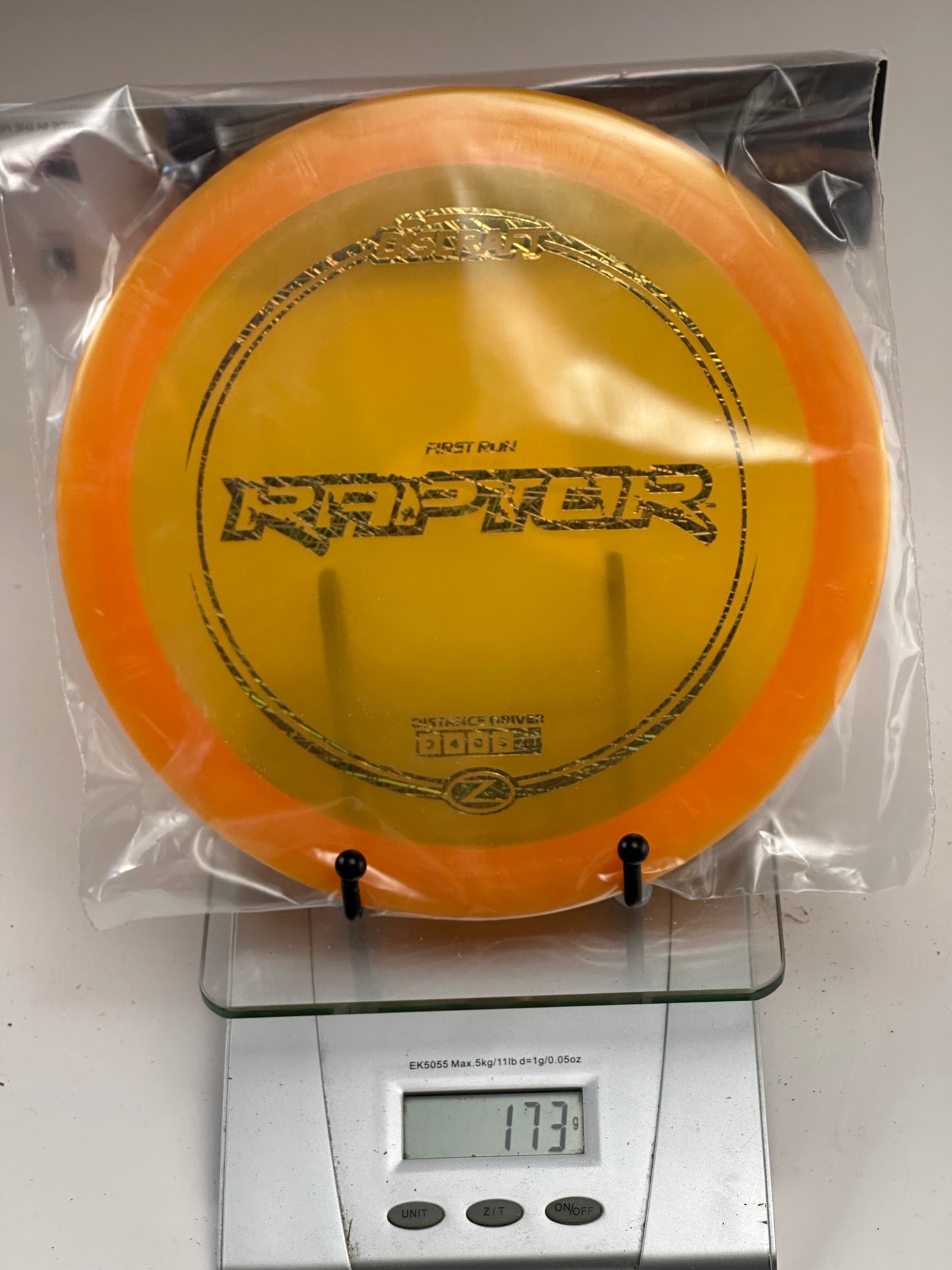 Discraft Z Raptor First Run Distance Driver – Clear Yellow w/ Orange Rim (173g)