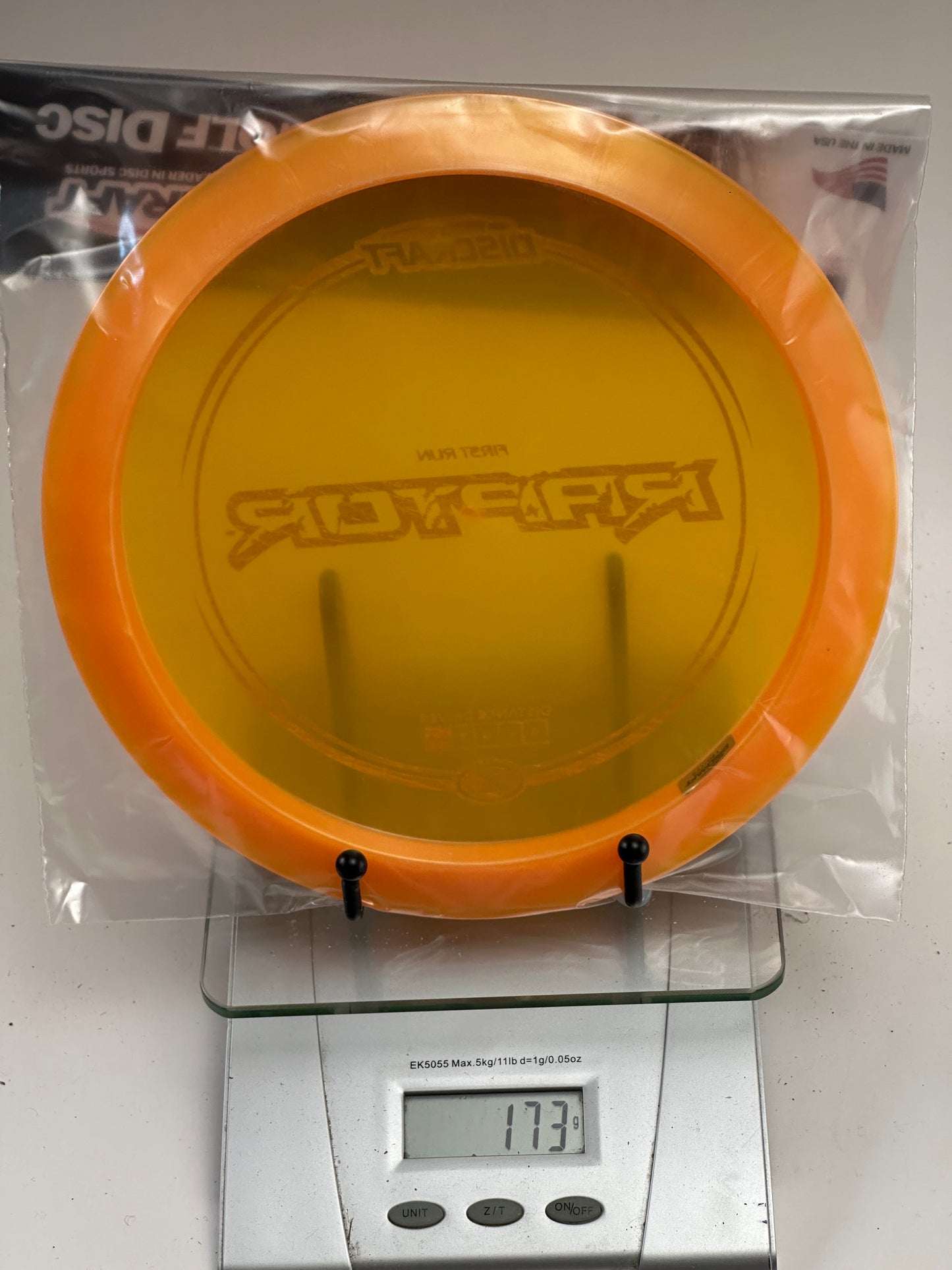 Discraft Z Raptor First Run Distance Driver – Clear Yellow w/ Orange Rim (173g)