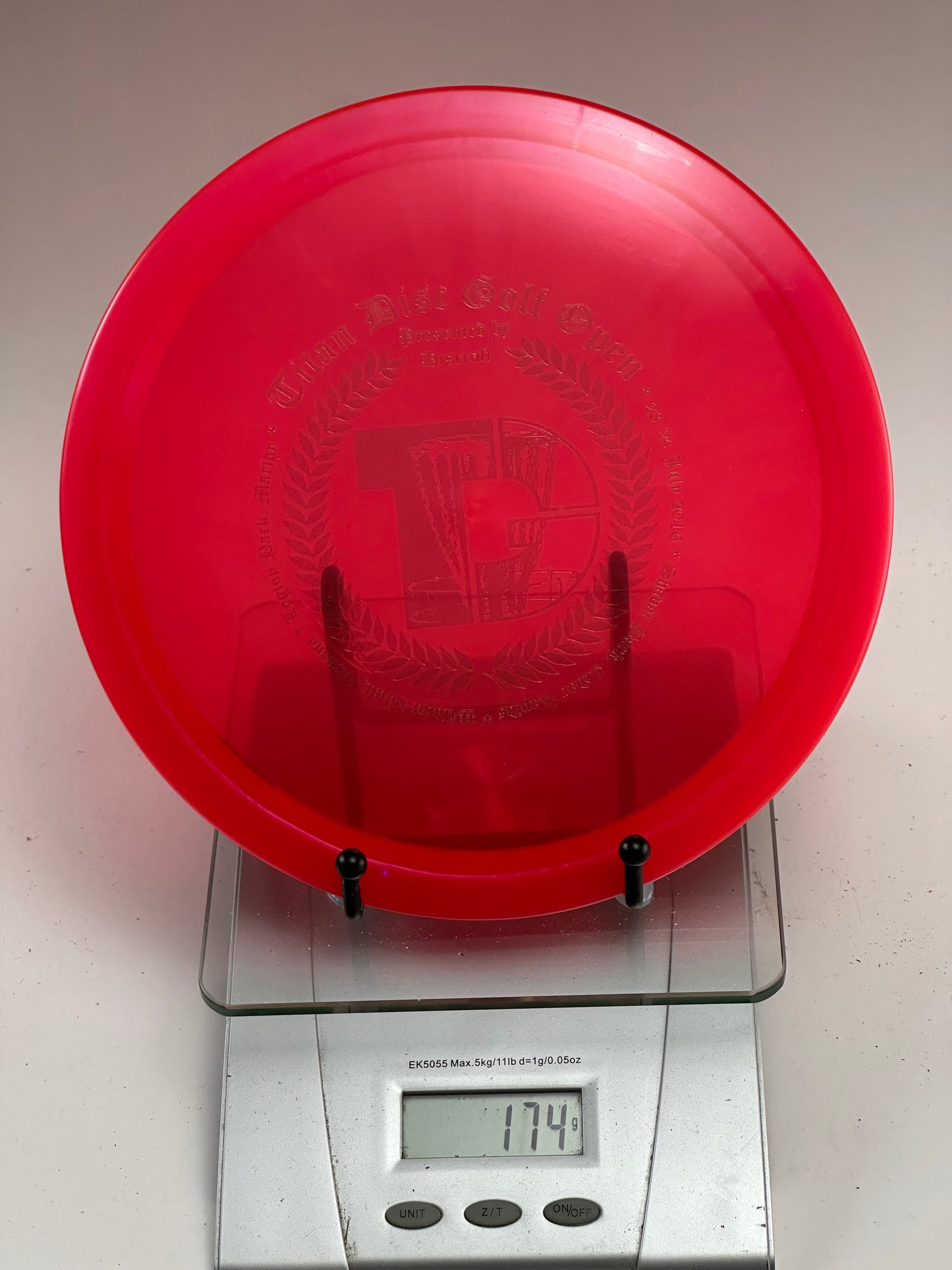 Discraft Z Line Undertaker – Transparent Red, Titan Disc Golf Open Stamp