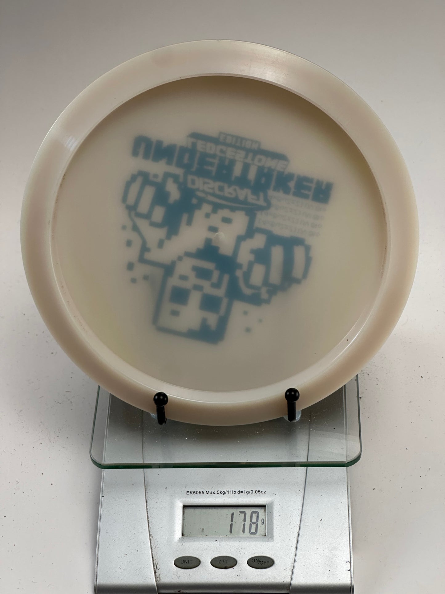 Discraft Undertaker UV Glo Z (Ledgestone) - Pixel Robot Stamp