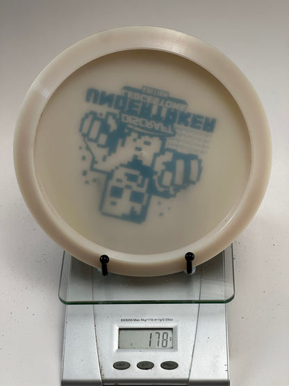 Discraft Undertaker UV Glo Z (Ledgestone) - Pixel Robot Stamp