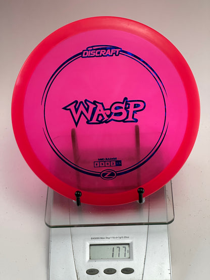 Discraft Z Wasp Midrange – Transparent Pink w/ Blue Stamp