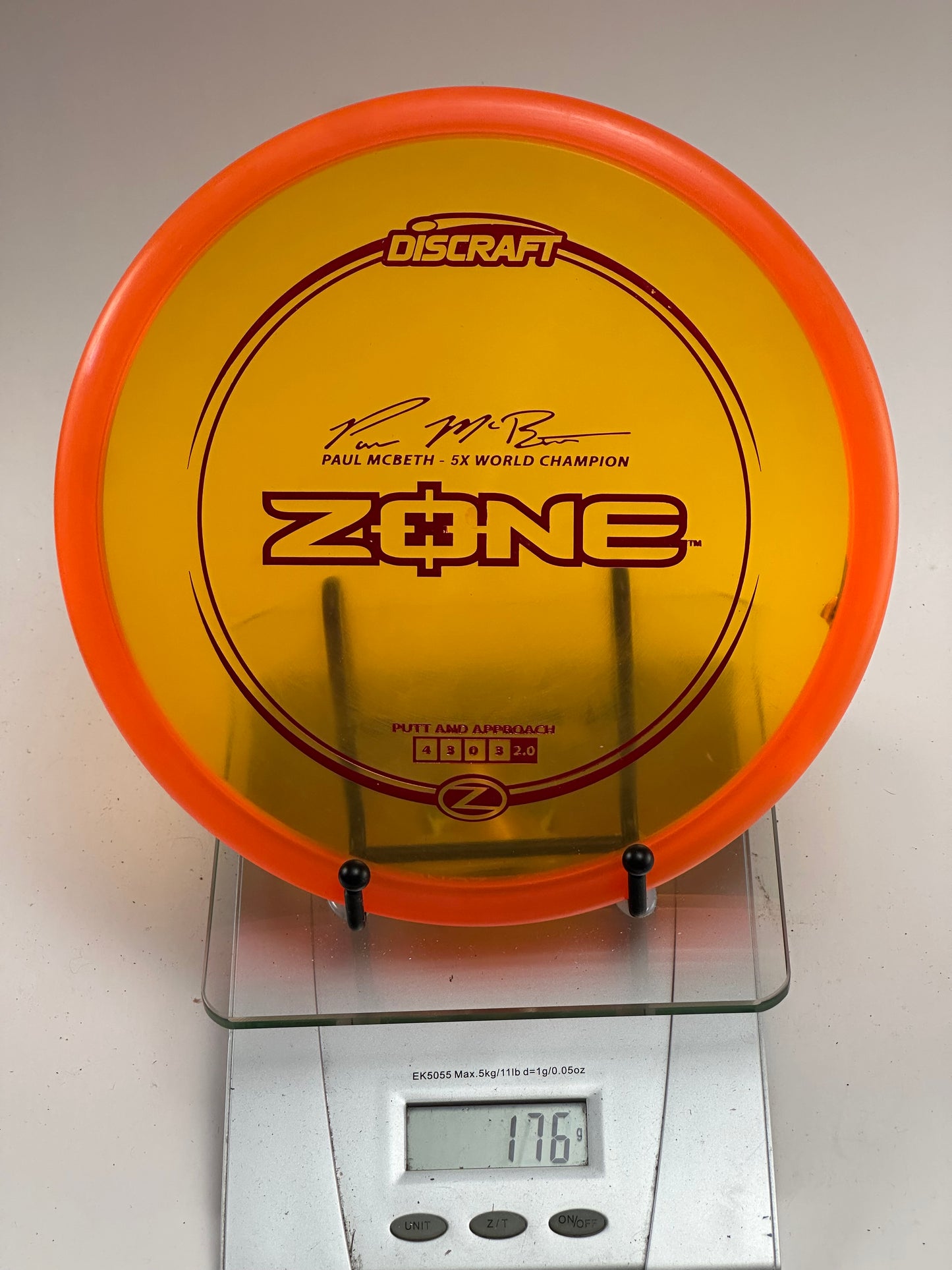 Discraft Zone Z (Paul McBeth 5x) Transparent Yellow w/ Orange Rim 176g