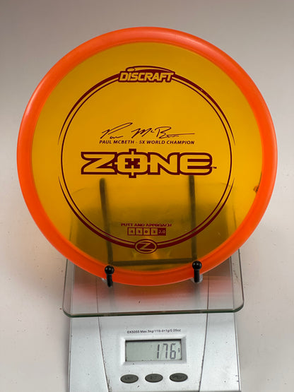 Discraft Zone Z (Paul McBeth 5x) Transparent Yellow w/ Orange Rim 176g