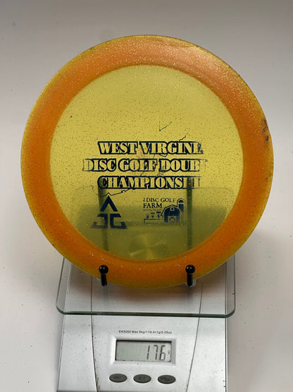 Innova Ape Champion Glow (Glo) Sparkle Orange Rim Yellow Center - Tournament Stamp