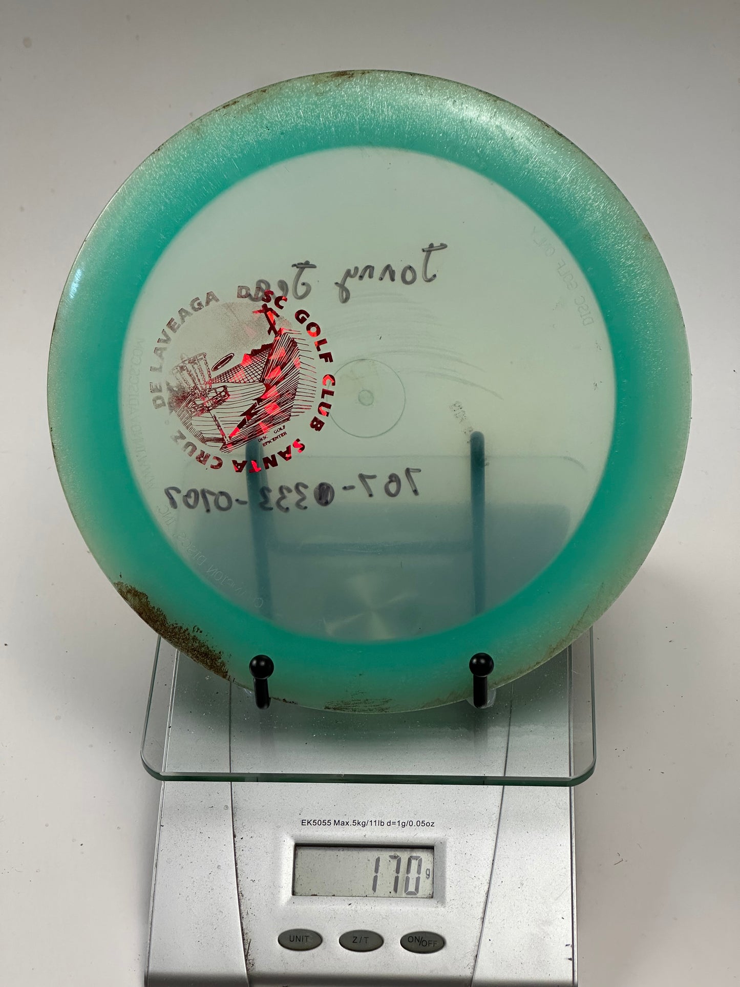 Innova Champion Boss – Transparent w/ Aqua Rim, Santa Cruz Disc Golf Club Stamp