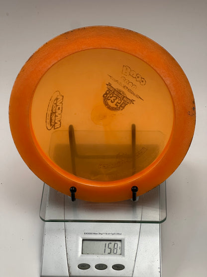 Innova Boss Blizzard Champion – Translucent Orange w/ Orange Rim (158g)