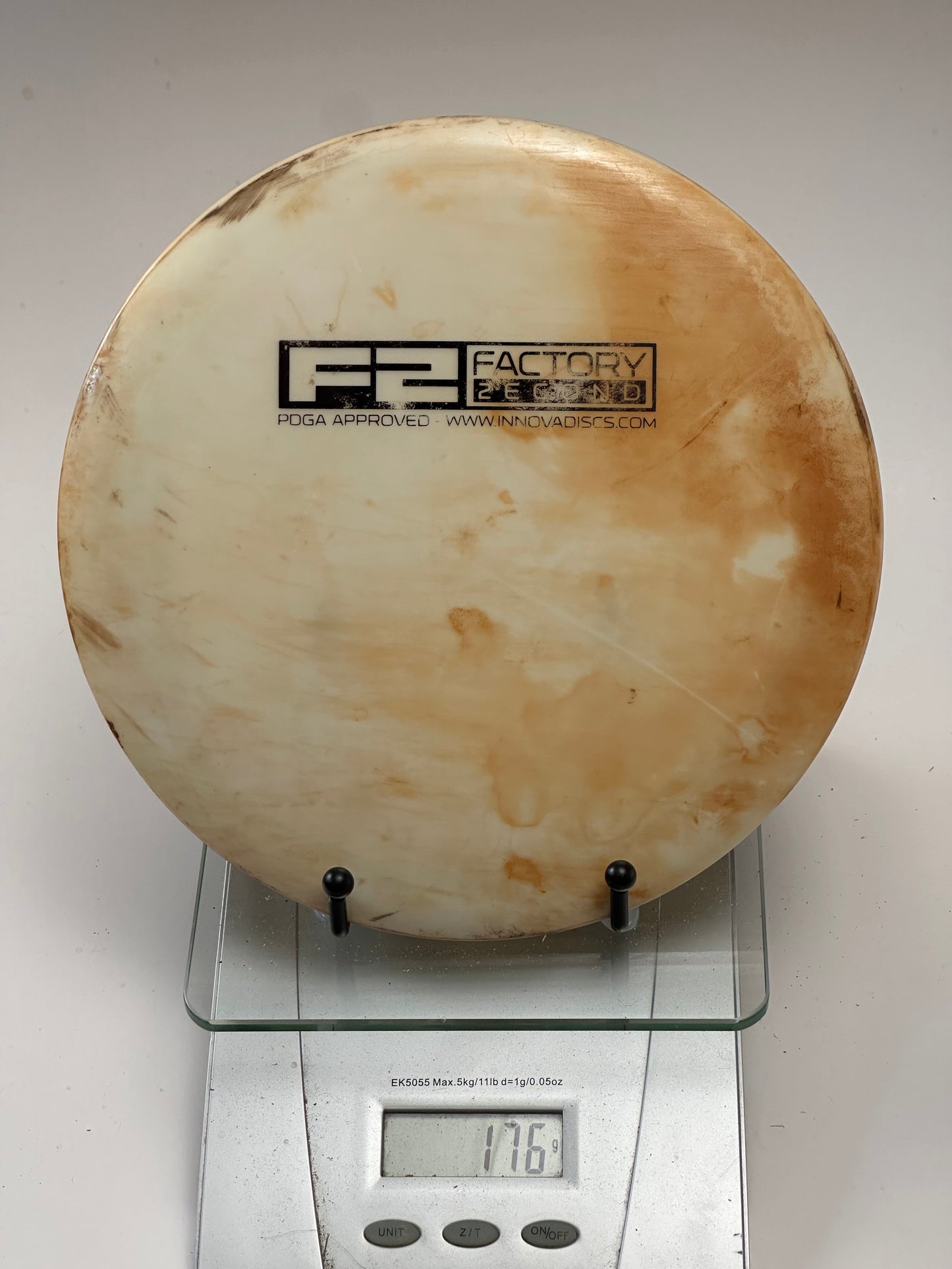 Innova Star Destroyer F2 Embossed – Cream/Tan Swirl Distance Driver