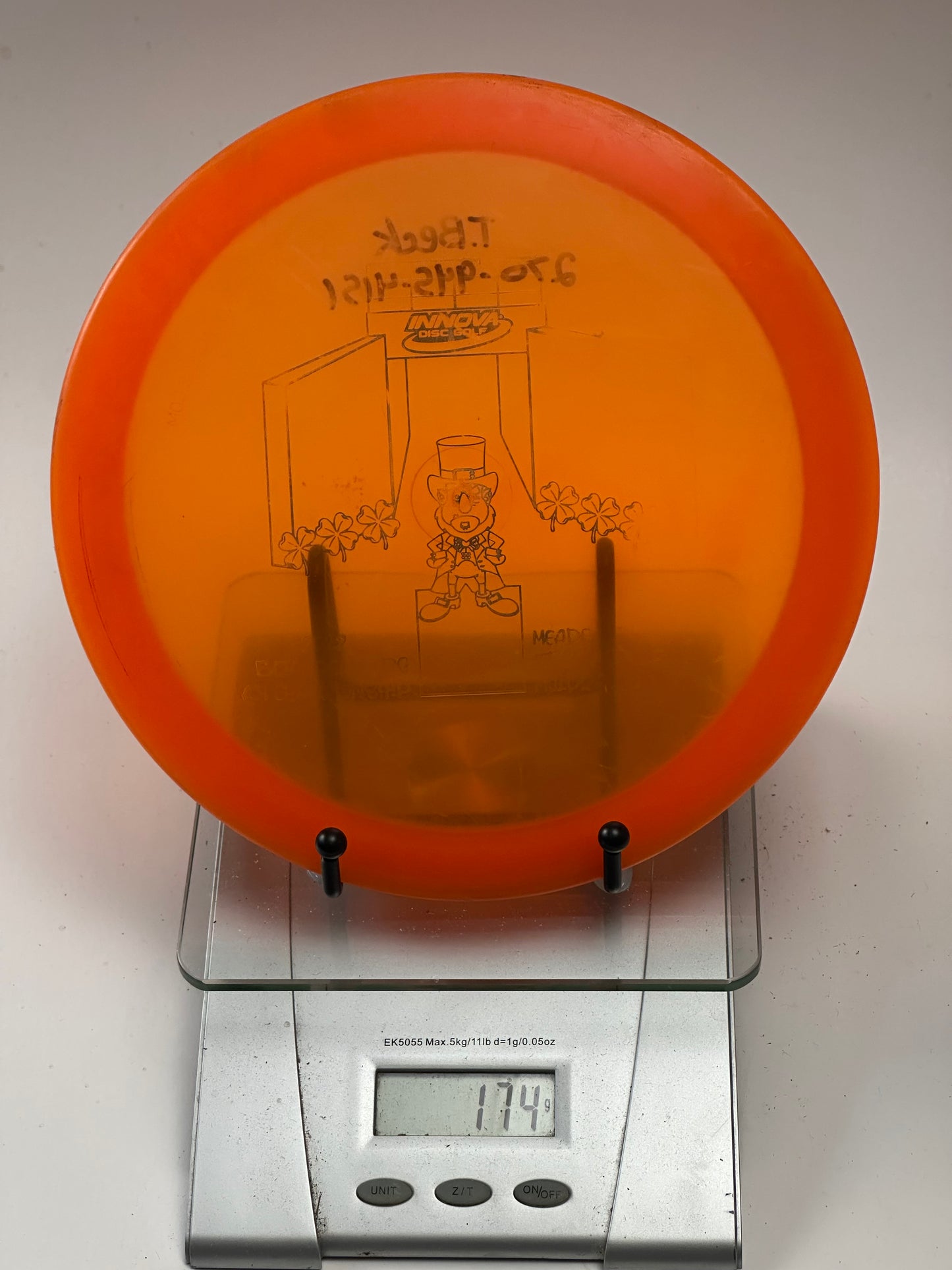Innova Champion Firebird – Orange Translucent Custom Leprechaun Stamp