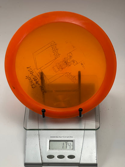 Innova Champion Firebird – Orange Translucent Custom Leprechaun Stamp