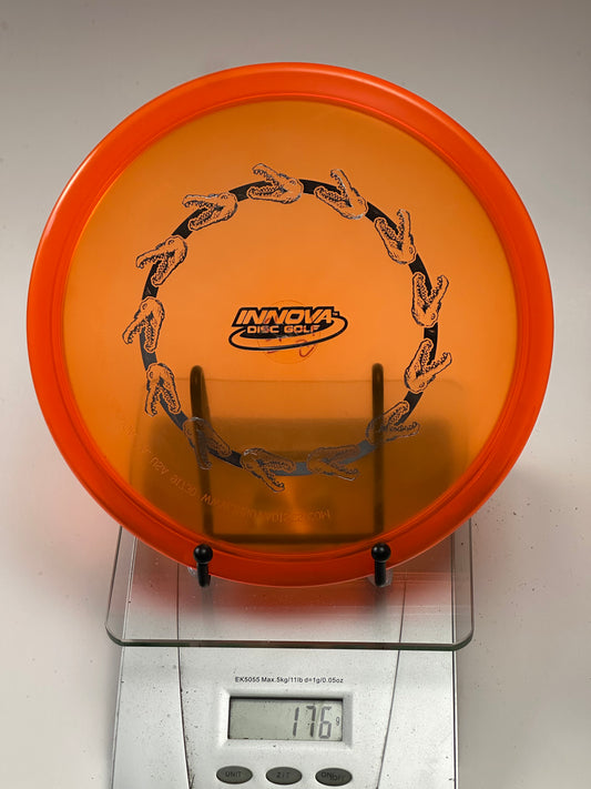 Innova Champion Gator – Transparent Orange Alligator Jaw Stamp (176g)
