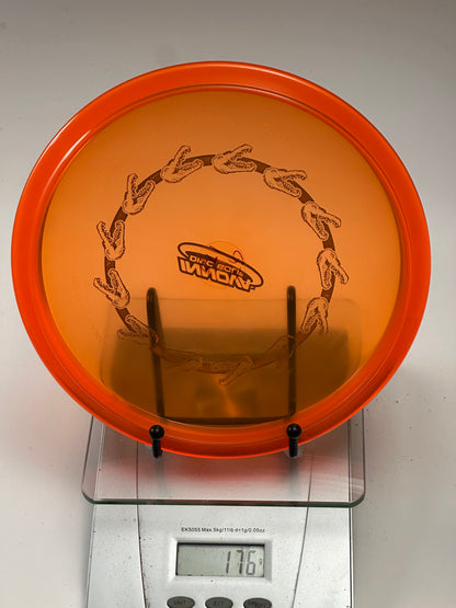 Innova Champion Gator – Transparent Orange Alligator Jaw Stamp (176g)
