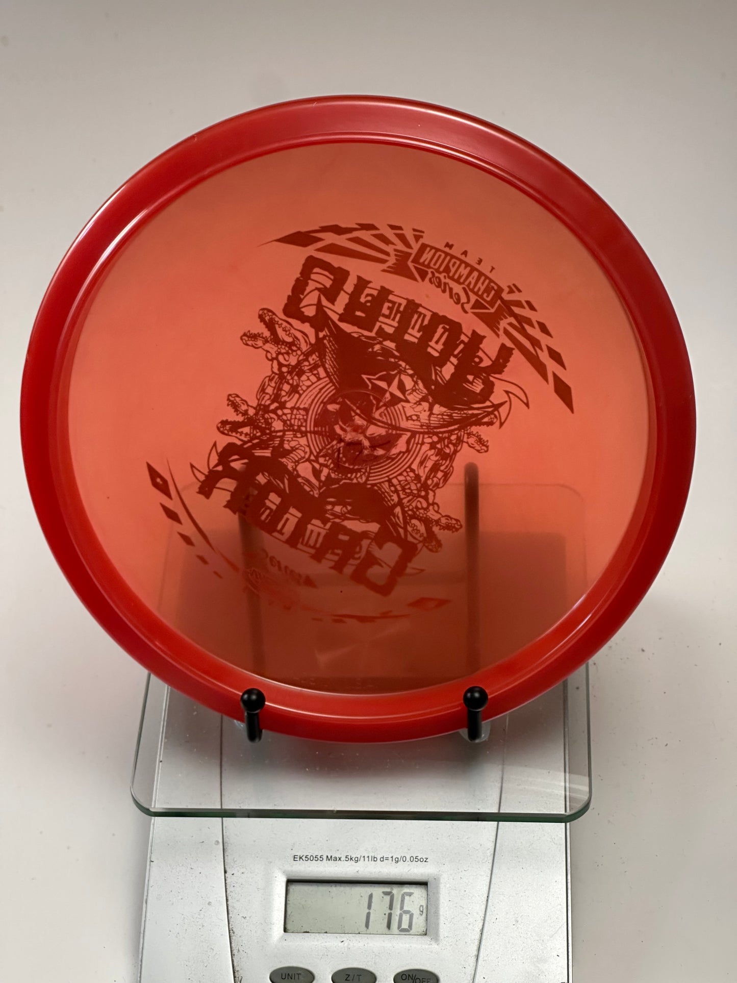 Innova Champion Gator – Team Champion Series Stamp (Transparent Red)